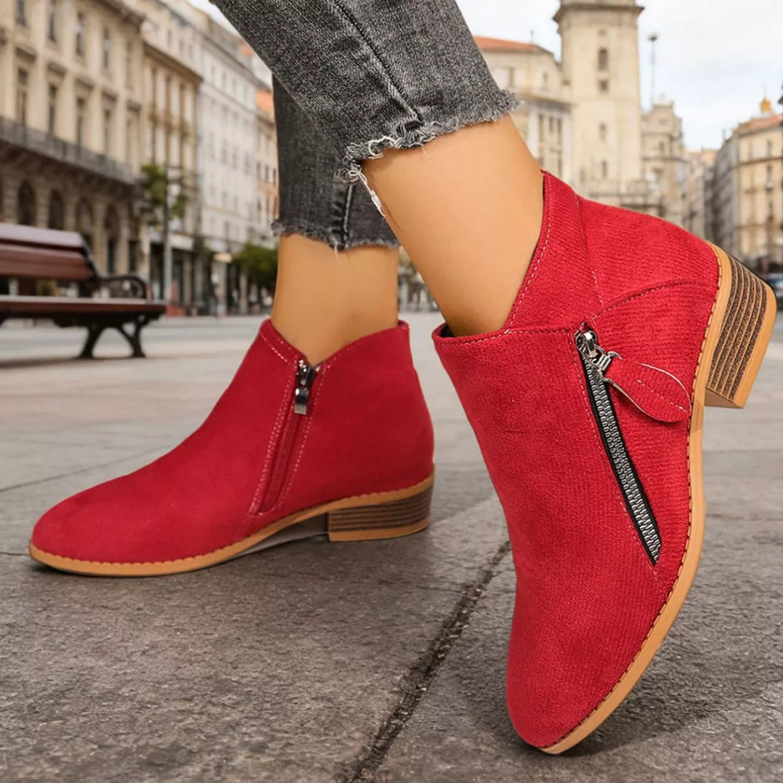 Red point-toe block heeled ankle boots with side zipper and light brown sole