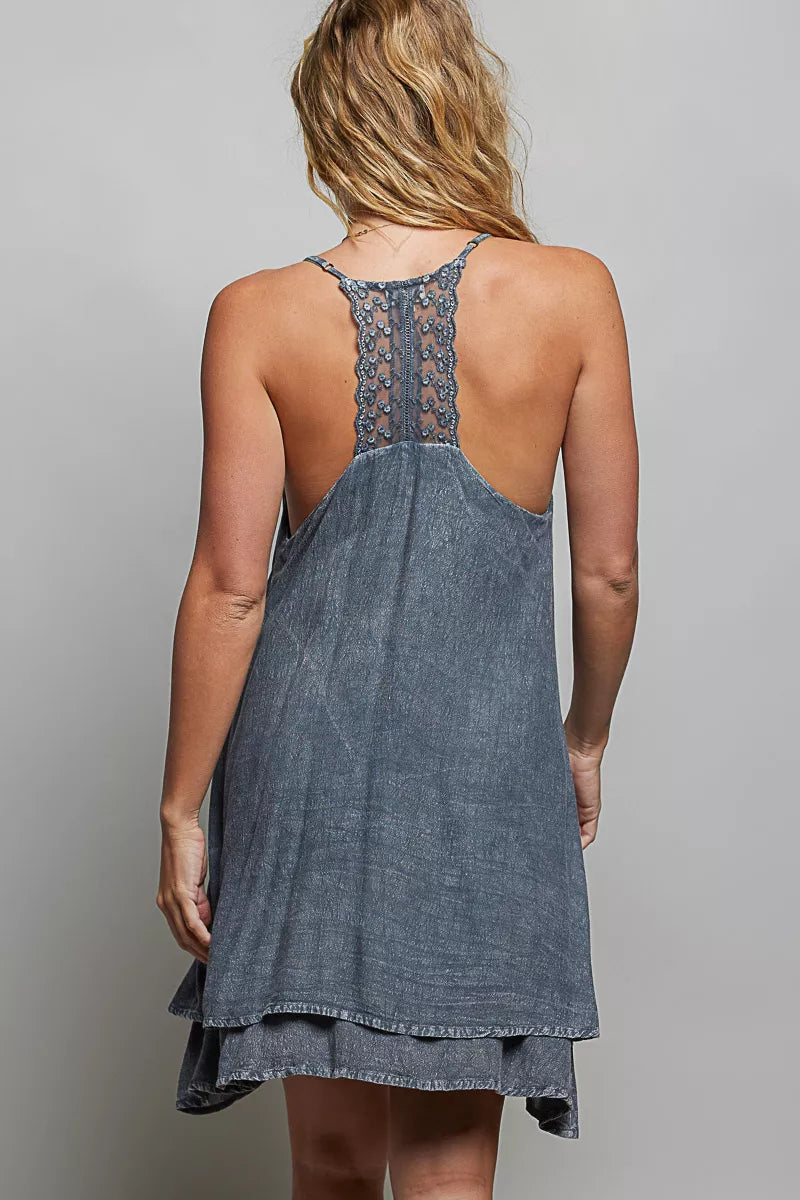 Back view of embroidered mini dress with open back and narrow straps, dark blue-gray