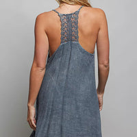 Back view of embroidered mini dress with open back and narrow straps, dark blue-gray