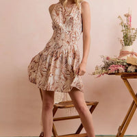 Taupe shell print smocked mini dress, sleeveless fit-and-flare silhouette