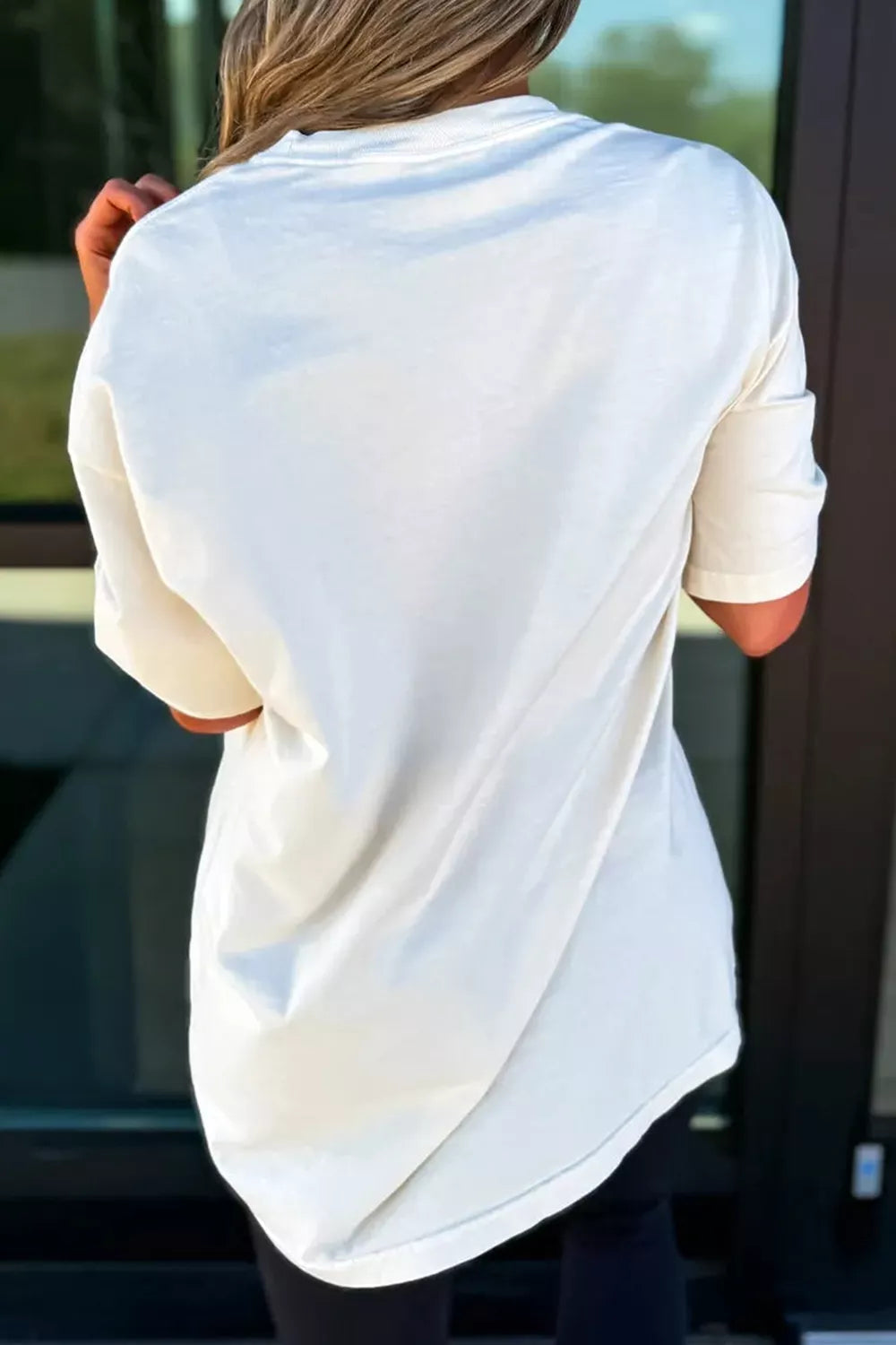 White short-sleeve t-shirt back view with loose draped fit