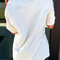 White short-sleeve t-shirt back view with loose draped fit