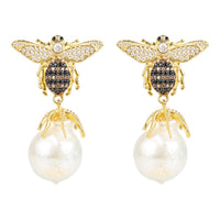 Pair of gold-tone bee drop earrings with crystal details and white pearl drops