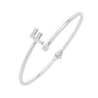 Silver bangle bracelet with initial F crystal charm on a slim cuff
