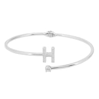 Silver bangle bracelet with openwork letter H and small stones