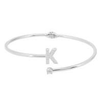 Silver bangle bracelet featuring a large K initial with crystal details.