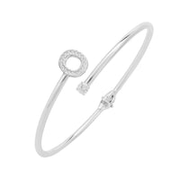 Silver bangle bracelet with glitter letter O charm and small dangling stone