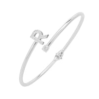 Silver bangle bracelet with diamond-look 'R' initial charm
