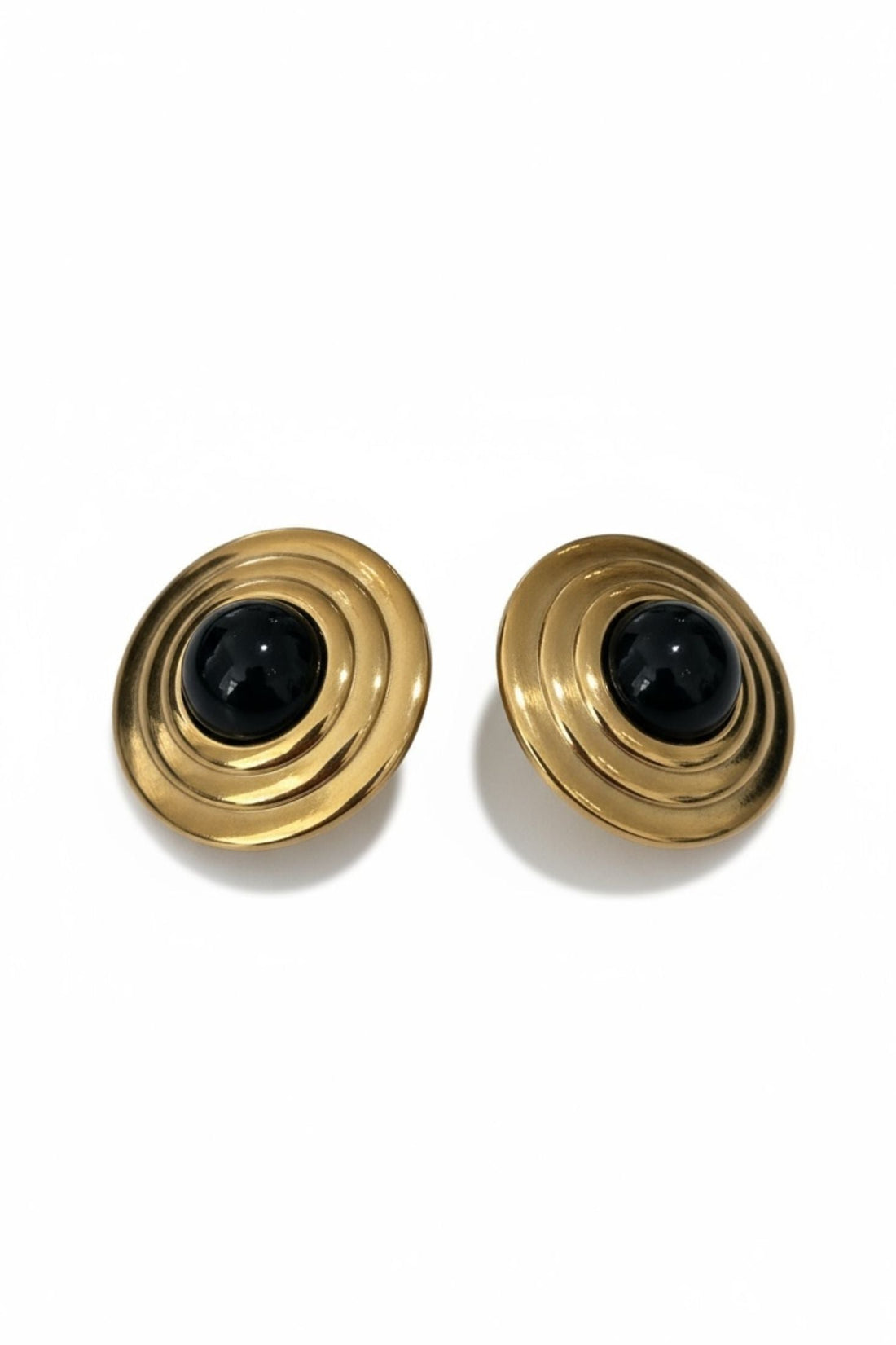 Gold spiral round stud earrings with black onyx cabochon center.