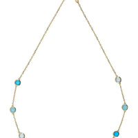 Gold-tone necklace with small blue round stones and a delicate linked chain