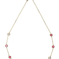 Gold charm necklace with alternating pink oval beads and light blue discs