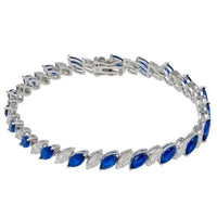 Sapphire tennis bracelet with oval blue stones in silver-tone linked setting