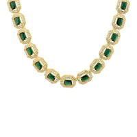 Gold-tone necklace with emerald-green square gemstone links and clear halo accents
