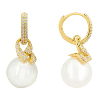 Gold knot drop earrings with pearl and pavé detail