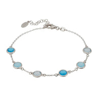 Silver bracelet with five oval blue stones and a toggle clasp