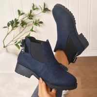 Navy round-toe chelsea boots with block heel, elastic gore and faux pearl charms