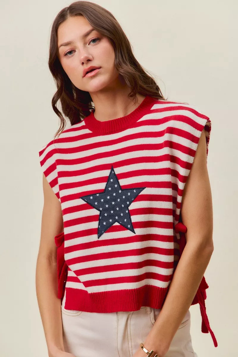 Red and ivory striped knit vest top with navy star patch, crew neck, side ties