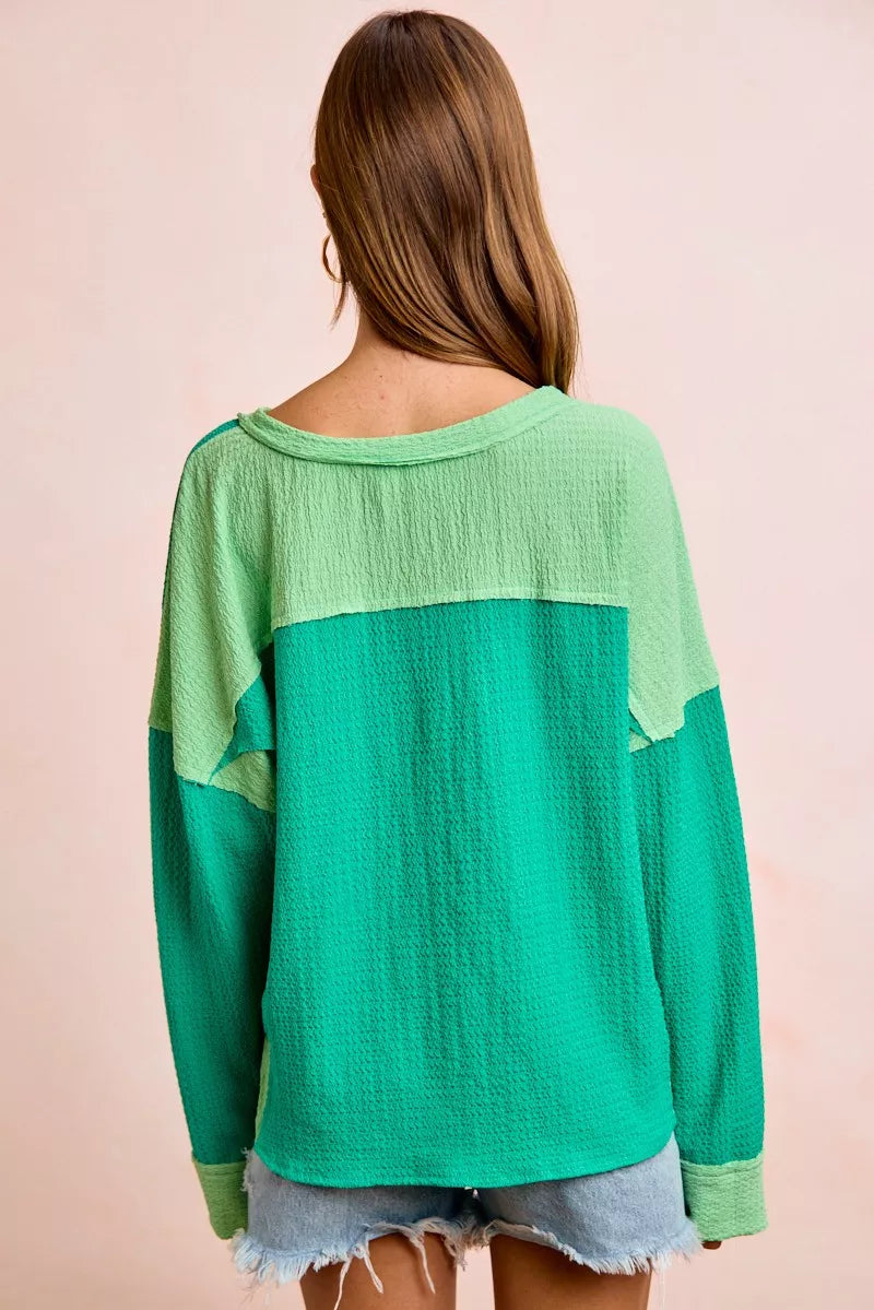 Textured jersey color block top, back view with emerald center and light green bands
