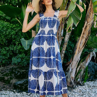 Square-neck sleeveless tiered midi dress with navy abstract print, smocked bodice