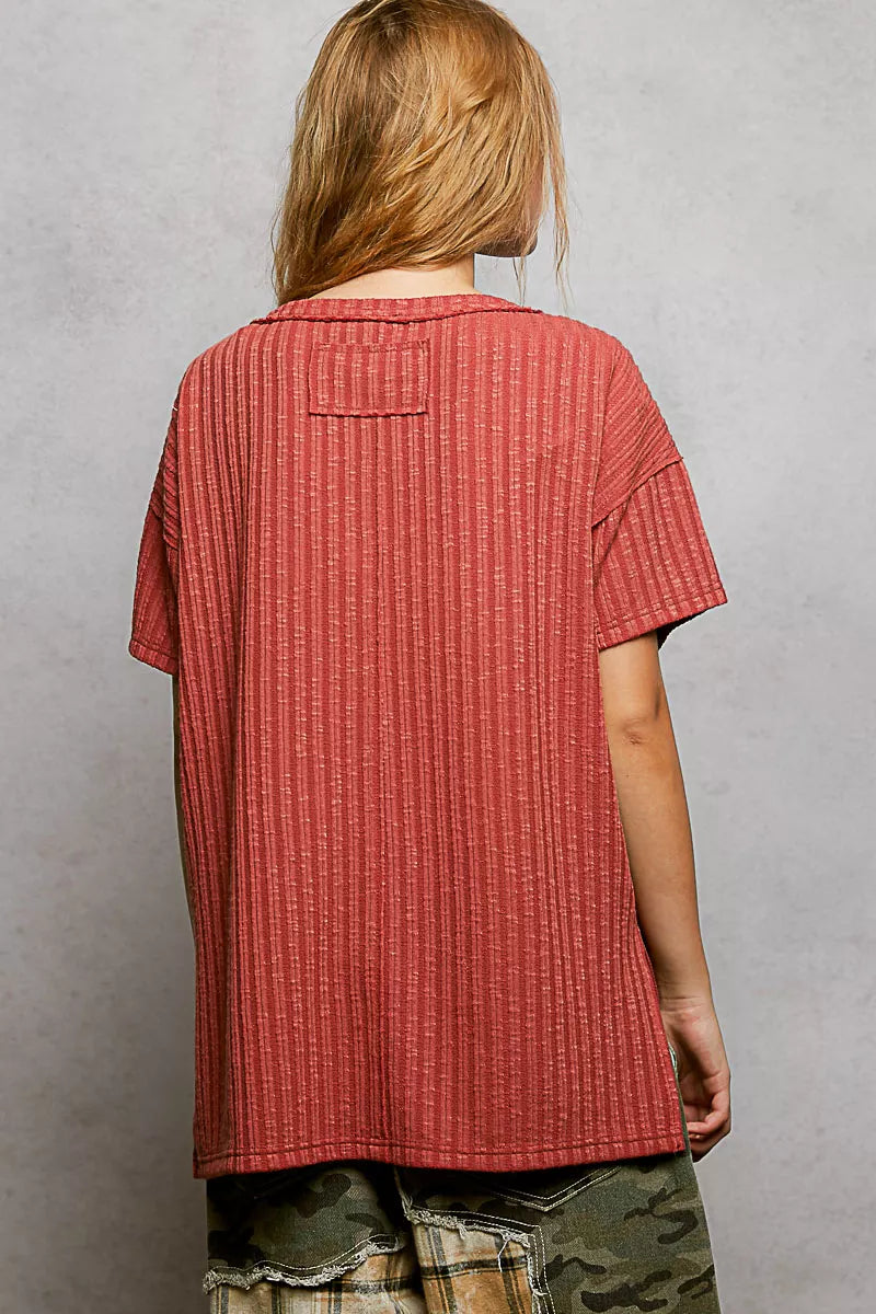 Terra cotta ribbed knit V-neck t-shirt back view with side slit