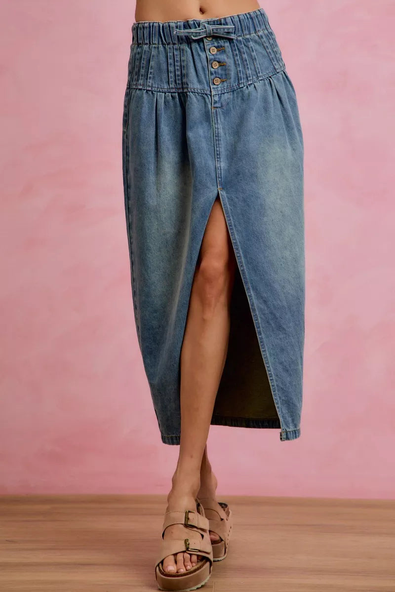 Washed denim pleated midi skirt with front slit and button waistband