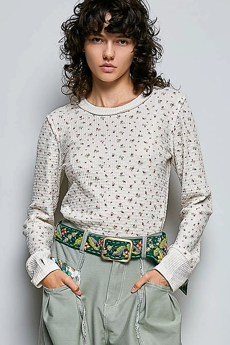 Ivory ribbed knit crew neck long sleeve top with tiny floral print