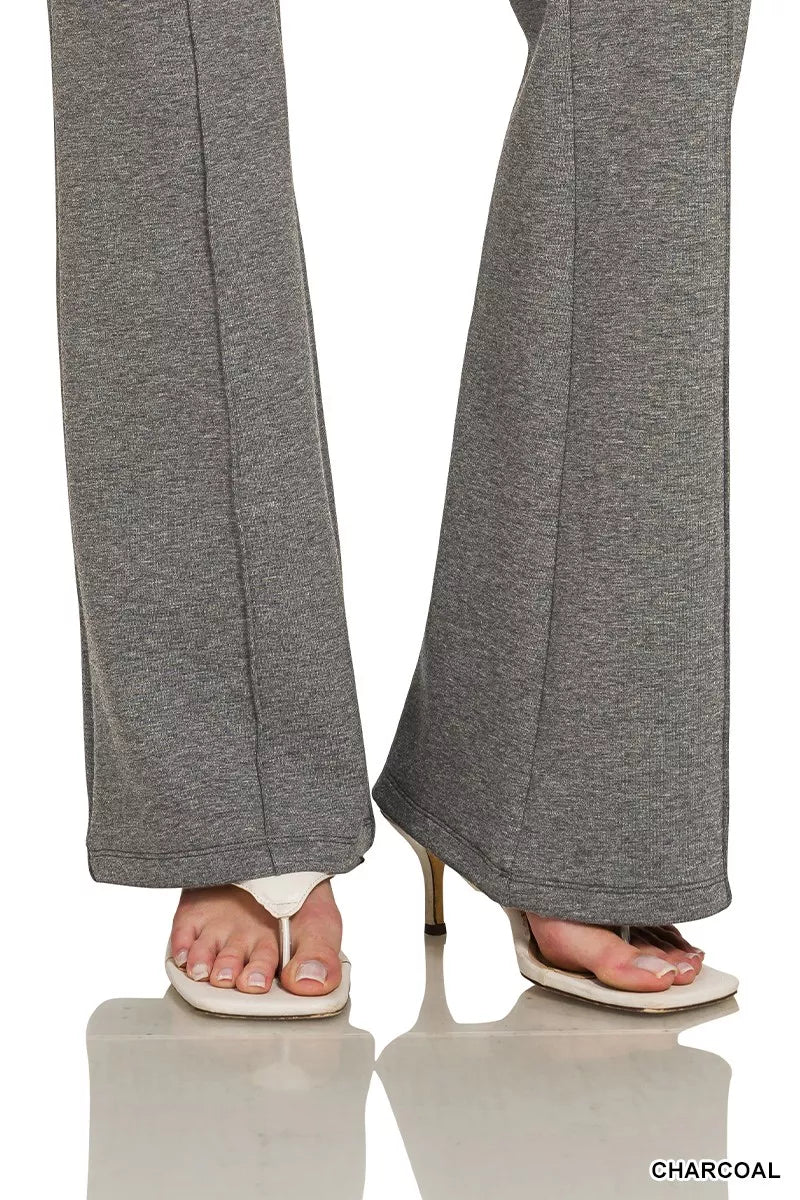 Charcoal wide-leg drawstring pants with straight hems, worn with sandals