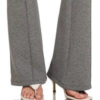 Charcoal wide-leg drawstring pants with straight hems, worn with sandals