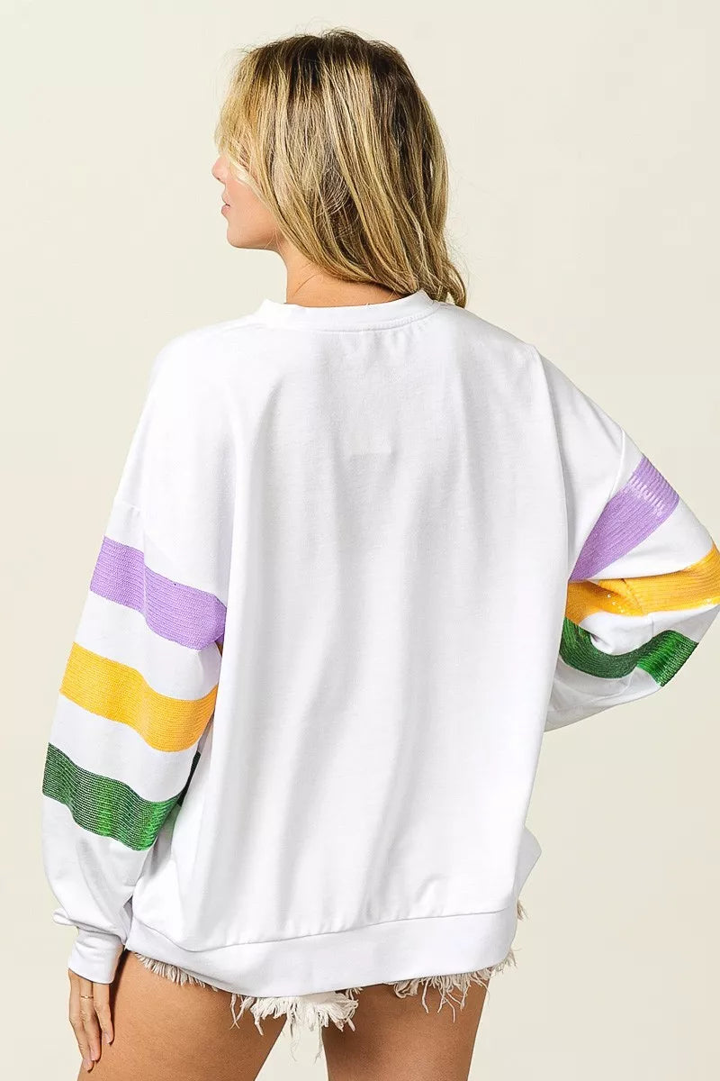Off-white round-neck sweatshirt with sequined purple, yellow, and green striped sleeves, back