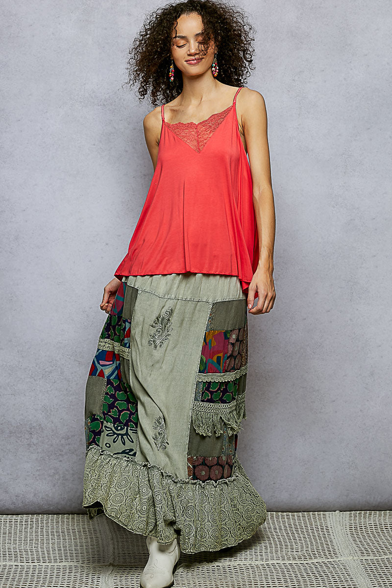 Sage patchwork ruffled skirt with multicolor side panels and lace-trim hem