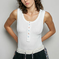 Off-white ribbed tank top with round neck and button henley placket