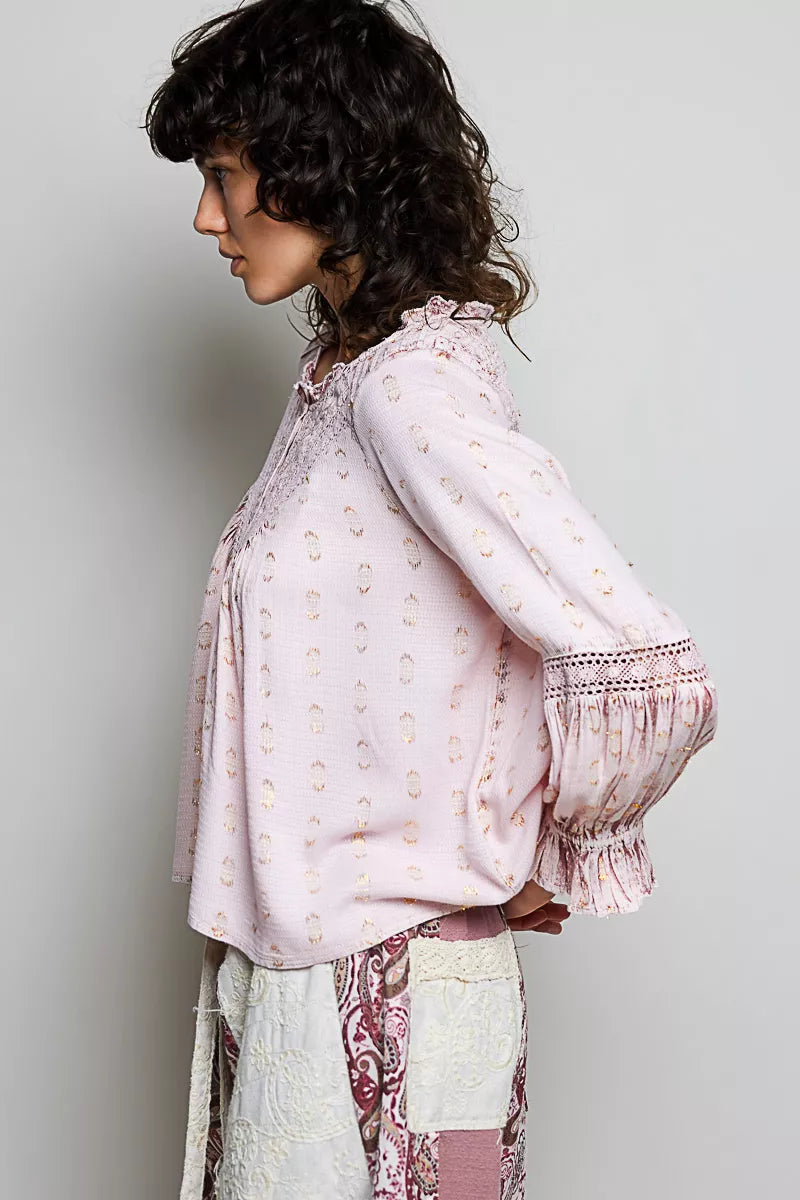Rose pink lace-trim blouse with flared ruffle cuffs and elastic sleeve opening, side view