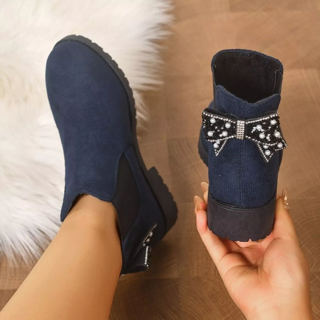 Navy round-toe block heel ankle boots with faux pearl stud side straps