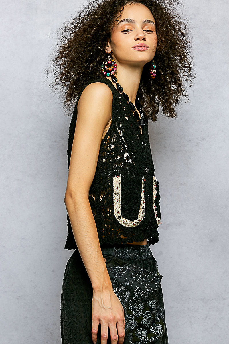 Black crochet cropped vest with horseshoe applique and button front