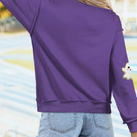 Mauve back view tunic sweatshirt with mock neck and ghost graphic print on sleeve