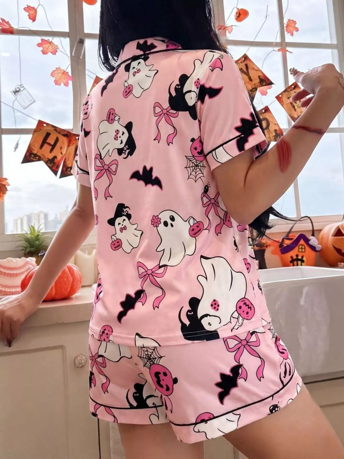 Pink Halloween lounge set with back view of button-down short-sleeve top and shorts