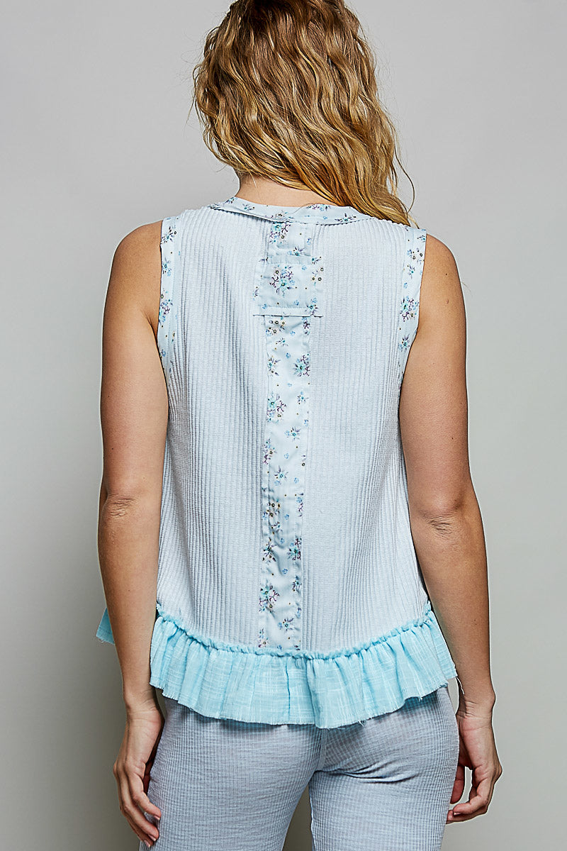 Powder blue back view ribbed tank with vertical floral print and ruffle trim