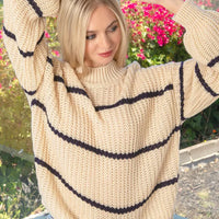 Taupe oversize striped sweater with navy horizontal stripes, ribbed neck and cuffs