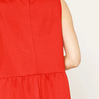 Red sleeveless tank dress back view with plain bodice and gathered skirt hem