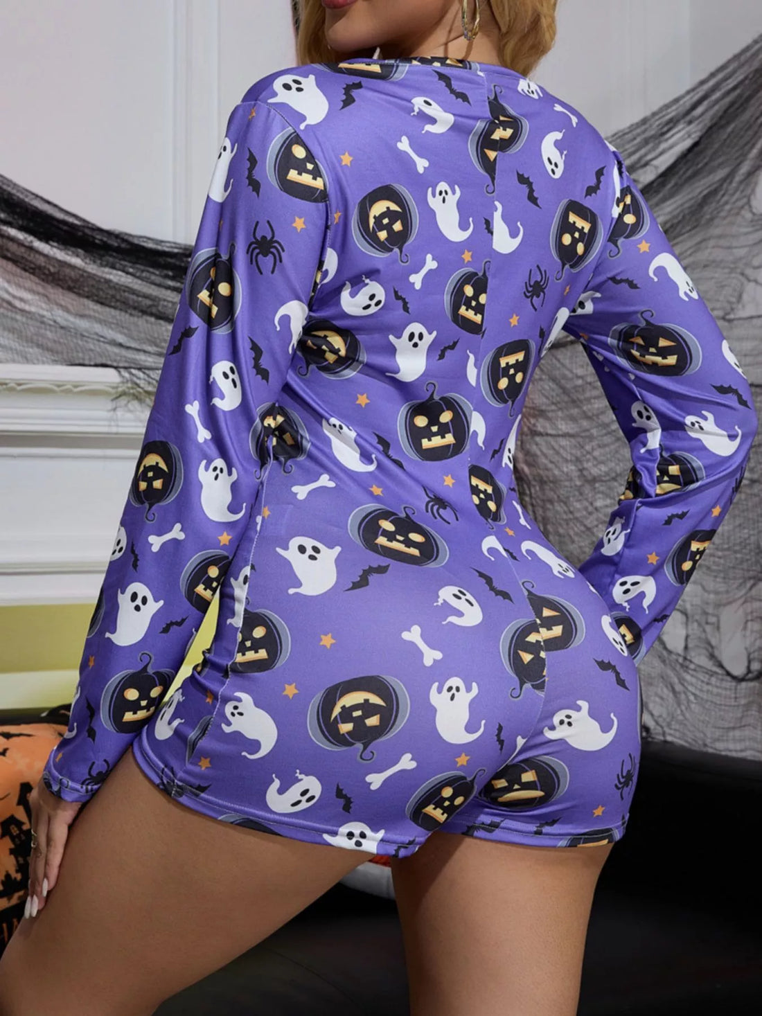 Blue long-sleeve button-front lounge romper with ghost and jack-o-lantern allover print