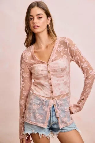 Dusty rose bow-pattern mesh cardigan top with shirred V-neck and button front