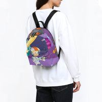 Kids backpack worn view on child, purple space astronaut graphic with black straps