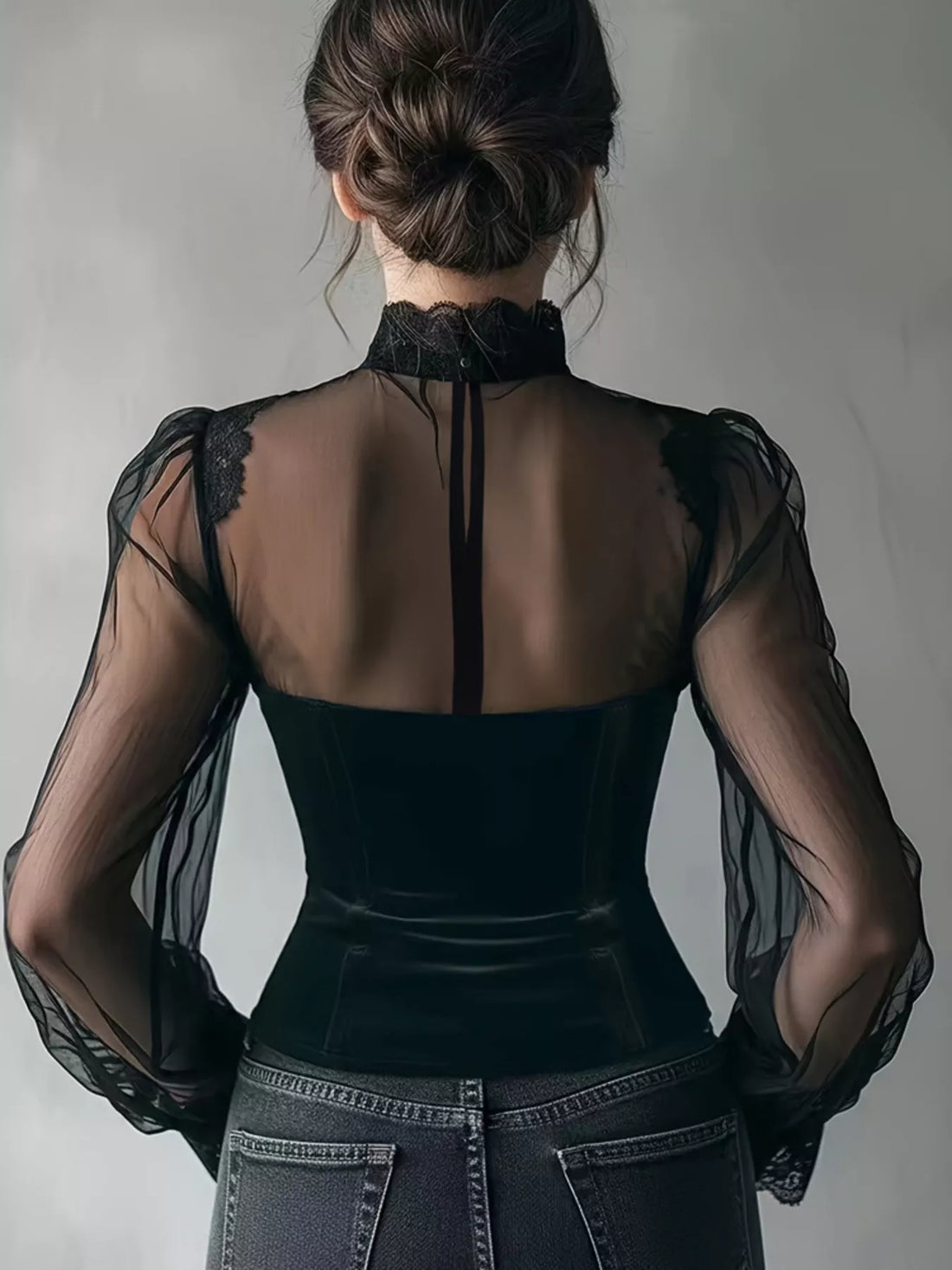Black velvet sheer-sleeve blouse, back view with lace-trim high neckline and corset fit