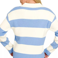 Back view of blue and ivory striped collared sweater with ribbed knit hem