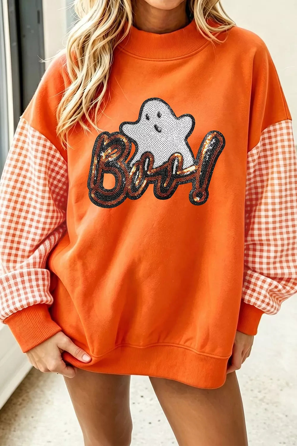 Orange Halloween sweatshirt with plaid patchwork sleeves and sequin &