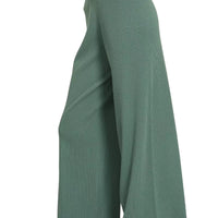 Teal-green wide-leg pants with draped knit texture and elastic waist