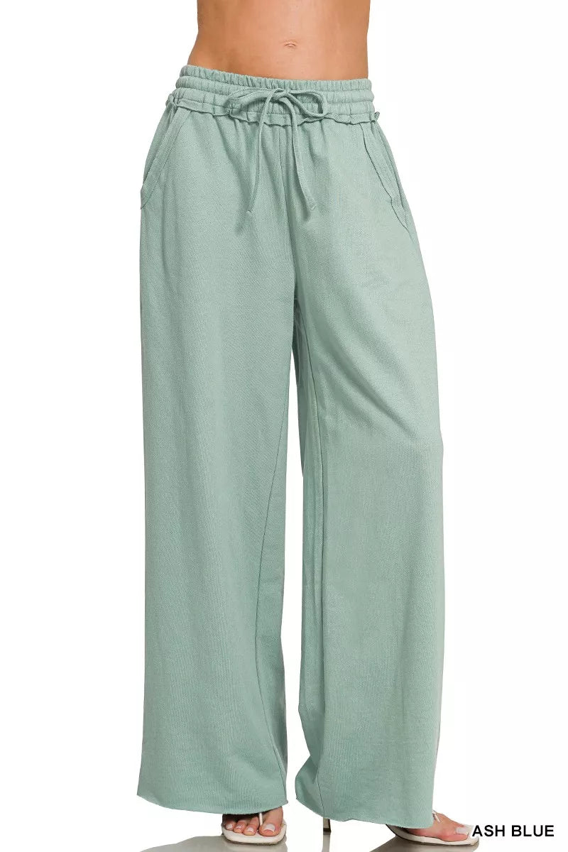 Ash blue wide-leg French terry sweatpants with elastic waistband and drawstring