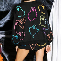 Back view of black ghost-print long sleeve top and shorts set, elastic waist