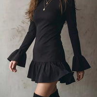 Black long-sleeve ruffle hem mini dress with flared bell sleeves
