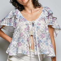 Angle front floral tie-front blouse with lace-trim neckline and tassel ties, off-white print